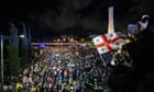 Georgia protests: prime minister hits back at US concerns over ‘foreign agents’ law as thousands close major intersection in Tbilisi – live