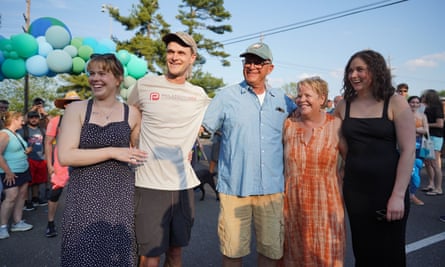 Tom (second left) at the ‘finish line’ in NJ last May, with his sister Lexi (left), his parents Tom Sr and Catherine, and his girlfriend Bonnie (right).