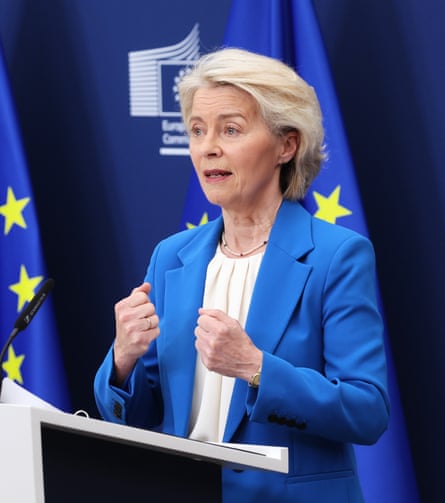 Ursula von der Leyen speaks to a conference audience from a podium