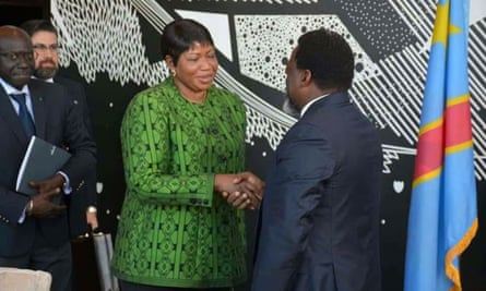 Bensouda shaking hands with a bearded Joseph Kabila