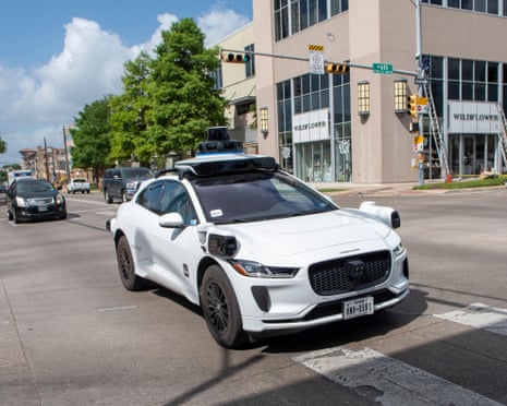 A Waymo Jaguar robotaxi at a cross-walk in Austin, Texas, in June 2025.