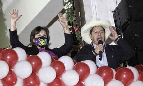 Pedro Castillo and Dina Boluarte celebrate after receiving credentials as leaders of Peru<br>epa09360580 The president-elect of Peru, Pedro Castillo (R), accompanied by his vice president, Dina Boluarte (L), celebrates before his supporters from a balcony in Plaza San Martin, after receiving the credentials of their positions in Lima, Peru, 23 July 2021. Castillo and Boluarte received this Friday the credentials of the elected president and vice president of Peru, respectively, for the period 2021-2026, delivered at an official ceremony organized by the National Elections Jury (JNE). EPA/STRINGER