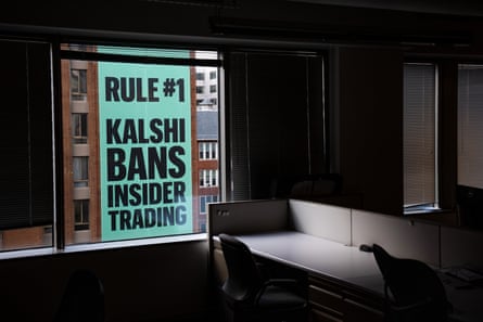 a Kalshi ad on a window