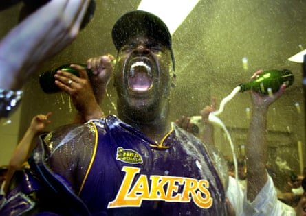 Shaquille O'Neal celebrates in the locker room after the Lakers won the 2001 NBA championship over the Philadelphia 76ers.