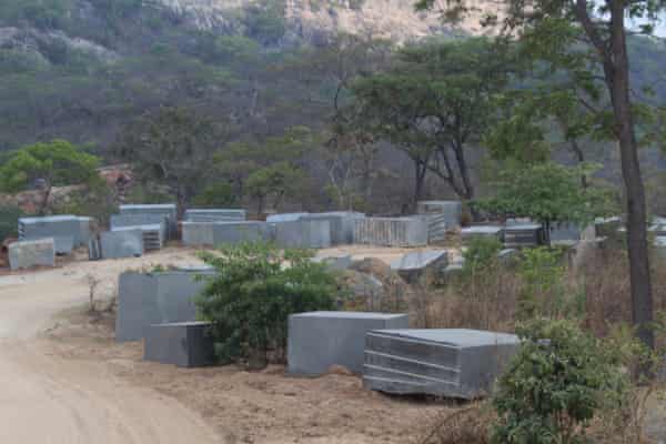 Cut up the remaining granite blocks in a farmland in Mutoko.