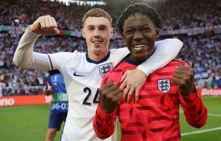 Cole Palmer (left) and Kobbie Mainoo celebrate England’s penalty shootout win over Switzerland