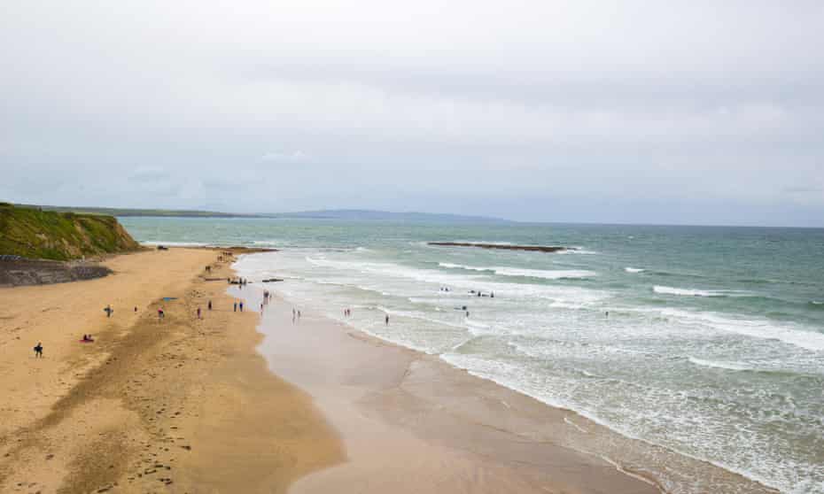 Surfers on Ballybunion Beach