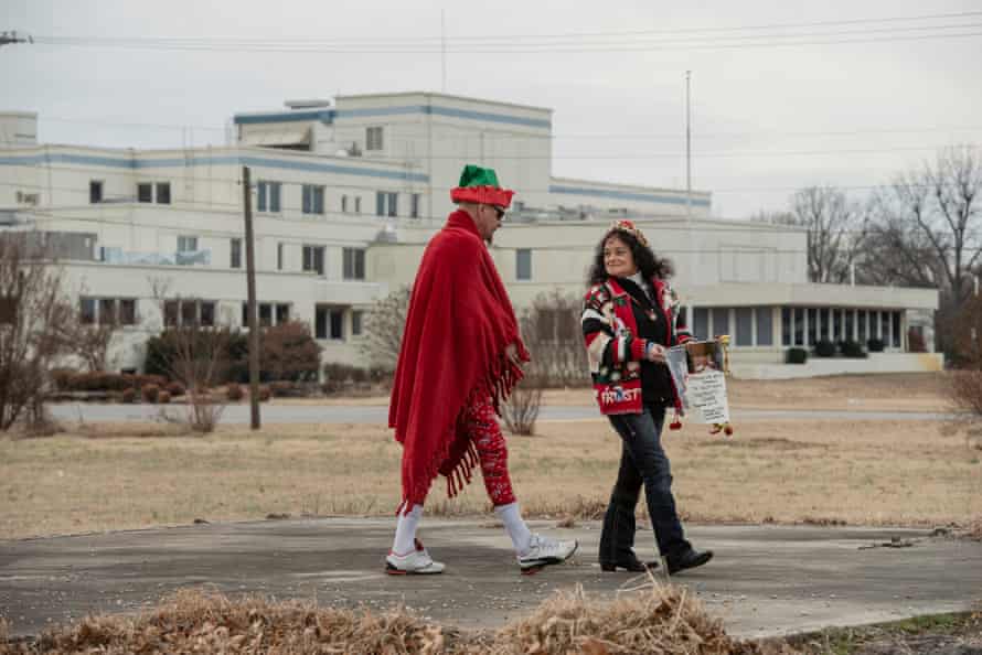 The empty Twin Rivers Regional Medical Center is visible as Gaetanna and Chad McCarthy try to raise donations to pay for cancer treatment for Margie Wilson on December 21 in Kennett, Missouri.