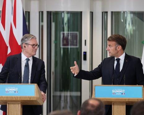 Britain's Prime Minister Keir Starmer and France's President Emmanuel Macron address a joint press conference in north-west London.