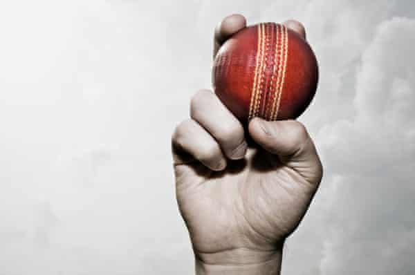 Cricket ball in hand