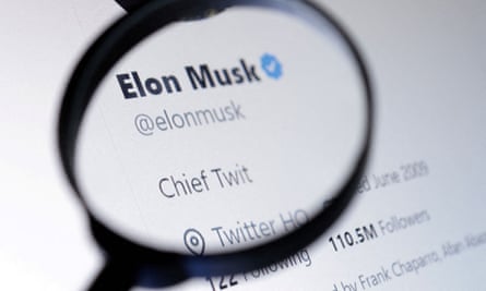Elon Musk’s name above "Chief Twit" on his Twitter account, seen through a magnifying glass