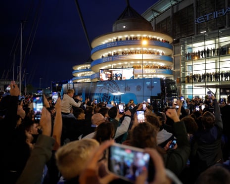 The Manchester City team coach arrives at the stadium before kick-off against PSG.