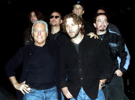 Giorgio Armani (left) with Australian actor Russell Crowe (front right) in February 2001.
