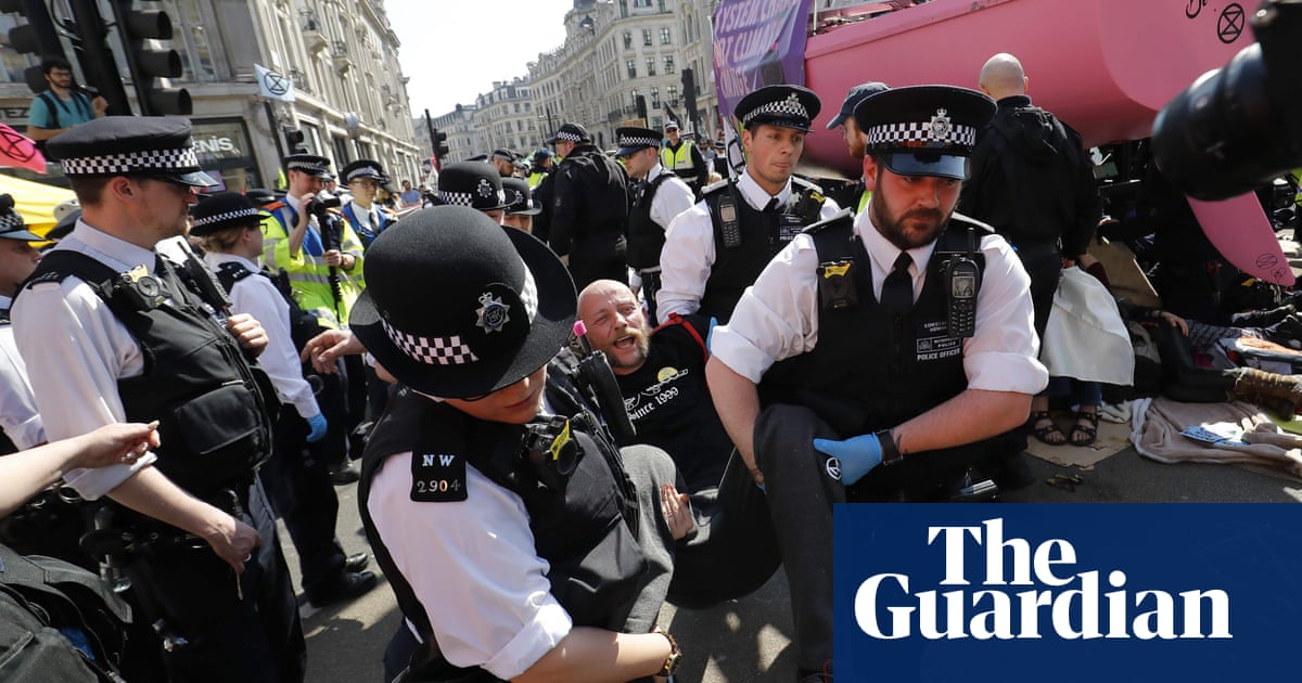 Police arrest climate change protesters on London’s Oxford Circus – video | Environment