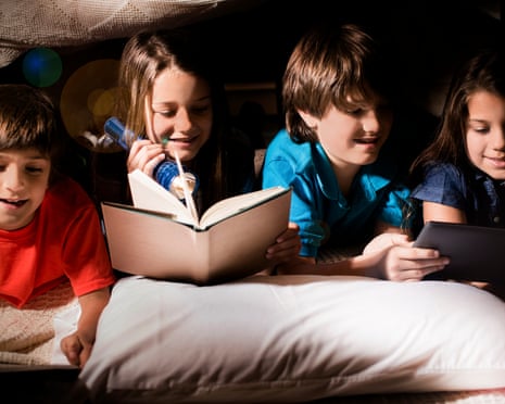 A group of children reading together