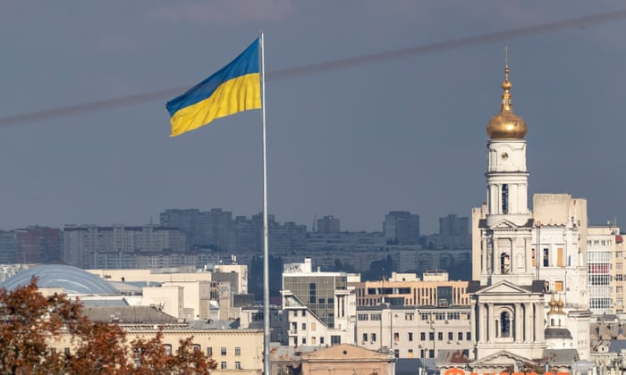A Ukrainian flag waves above Kharkiv city on Sunday.