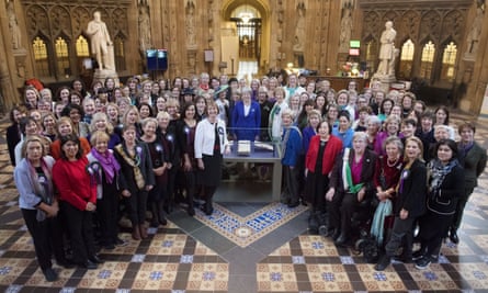 Theresa May and women from both houses of parliament in 2018