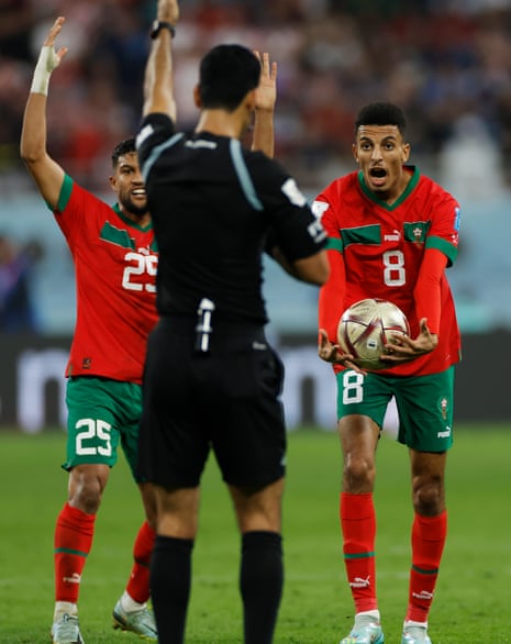 Morocco's Azzedine Ounahi talks himself into the book of referee Abdulrahman Al Jassim.