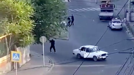 Gunmen kill at least 15 police and a priest in simultaneous attacks in Russia's Dagestan – video