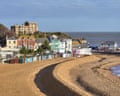 Broadstairs beach and bay, with colorful beach huts lining the curving sandy shore