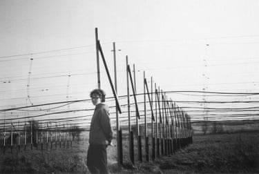 Jocelyn Bell Burnell and the Cambridge array, 1967Bell Burnell, a physicist, stands in front of the radio telescope array she helped build at the University of Cambridge. It first detected the radio wave emissions of pulsars. She became president of the Royal Astronomical Society from 2002 to 2004