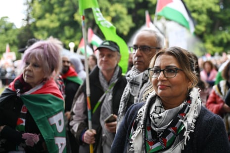 Mehreen Faruqi stands with other protesters at a July protest.