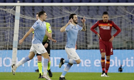 Luis Alberto (centre) celebrates after scoring Lazio’s third goal in the Rome derby.