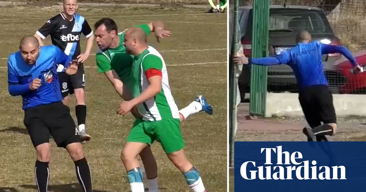 Bulgarian football match abandoned as referee chased off pitch – video