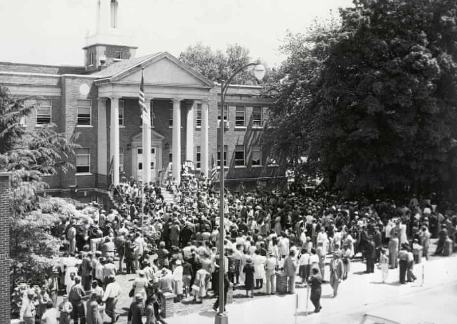 Large crowd outside a courthouse
