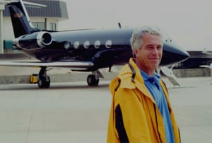 Jeffrey Epstein standing in front of one of his private aircraft.