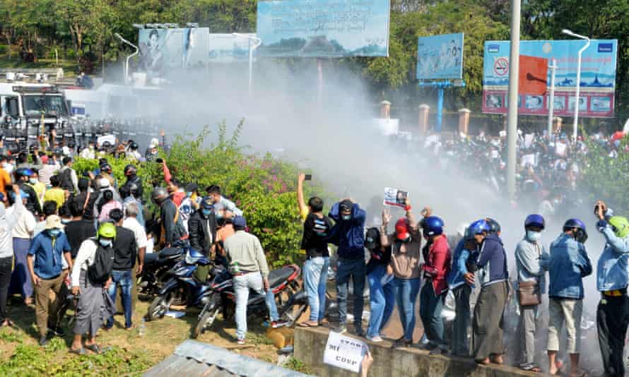Myanmar police have used water cannon against demonstrators protesting against the coup.