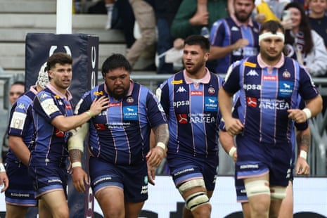 Ben Tameifuna (second right) after scoring.