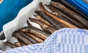 Oosterbaan smokes his eels on board the boat