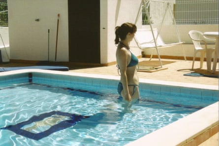 A woman in a swimming pool.