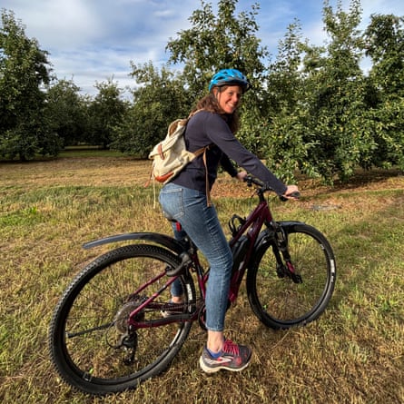 Writer Rhiannon Batten on her ebike in the Herefordshire countryside, UK.