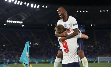 Harry Kane of England celebrates with Raheem Sterling after scoring their side’s third goal.