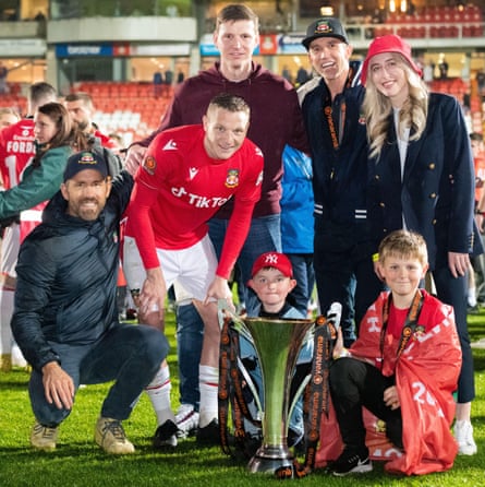 The Mullin family celebrate Wrexham’s promotion to League Two with the co-owners at the end of last season.