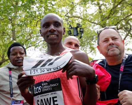 Sabastian Sawe pinch his historical clip written connected nan broadside of his shoes.