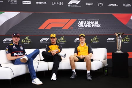 McLaren’s Lando Norris and Oscar Piastri and Red Bull’s Max Verstappen alongside the world championship at a press conference ahead of the F1 Abu Dhabi Grand Prix at the Yas Marina circuit