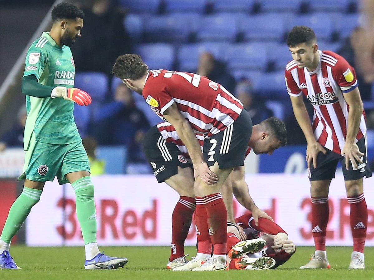 sheffield united s john fleck discharged from hospital after on pitch collapse championship the guardian