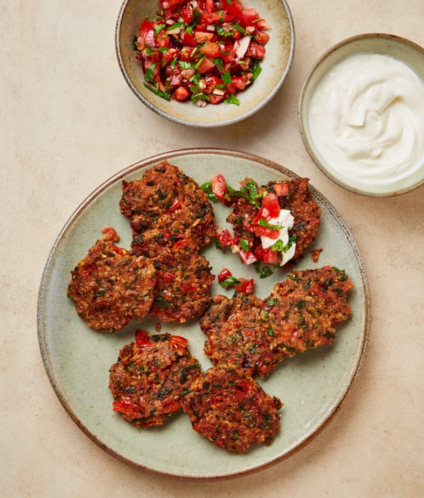 Yotam Ottolenghi's tomato and bulgur fritters with yogurt and tomato salsa.