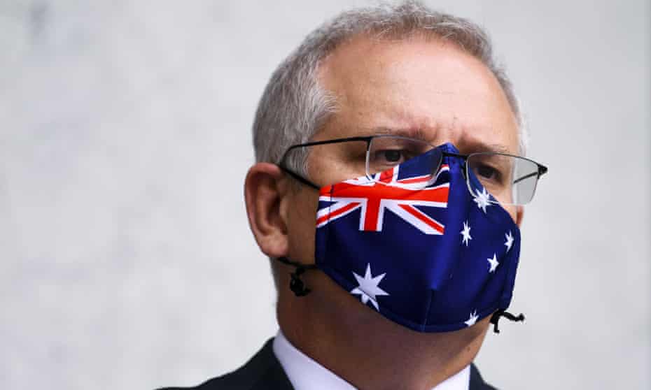 Prime minister Scott Morrison wears an Australian flag mask