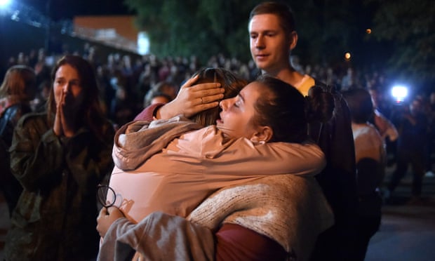 A woman hugs a relative released from the Okrestina prison in Minsk. 