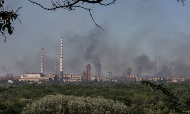 Smoke rises after a military strike on a compound of Sievierodonetsk's Azot chemical plant.