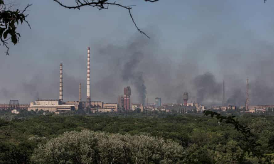 Smoke rises after a military strike on a compound of Sievierodonetsk’s Azot Chemical Plant, amid Russia’s attack on Ukraine, in the town of Lysychansk, Luhansk region, Ukraine June 10, 2022.