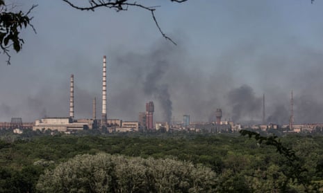 Smoke rises after a military strike on a compound of Sievierodonetsk’s Azot Chemical Plant, amid Russia’s attack on Ukraine, in the town of Lysychansk, Luhansk region, Ukraine June 10, 2022.