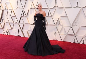 Nominated for a Star is Born, Lady Gaga continued her red carpet success in a black gown by Alexander McQueen with a crinoline, black latex gloves and a Tiffany yellow diamond, one of the largest in the world, apparently valued at $30m and last worn by Audrey Hepburn in Breakfast at Tiffany's