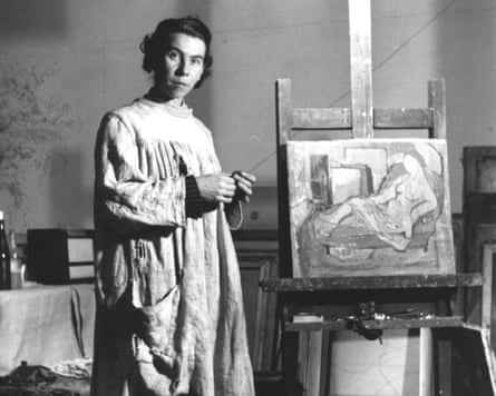 Tove Jansson painting in her studio.