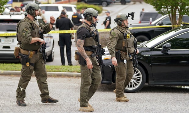 Authorities outside Columbiana centre mall in Columbia, South Carolina, following the shooting.