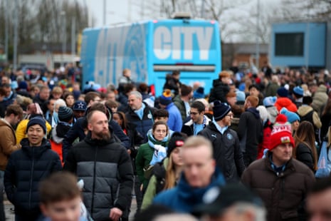 Manchester City fans arrive at the stadium prior to ther side’s match against Everton.